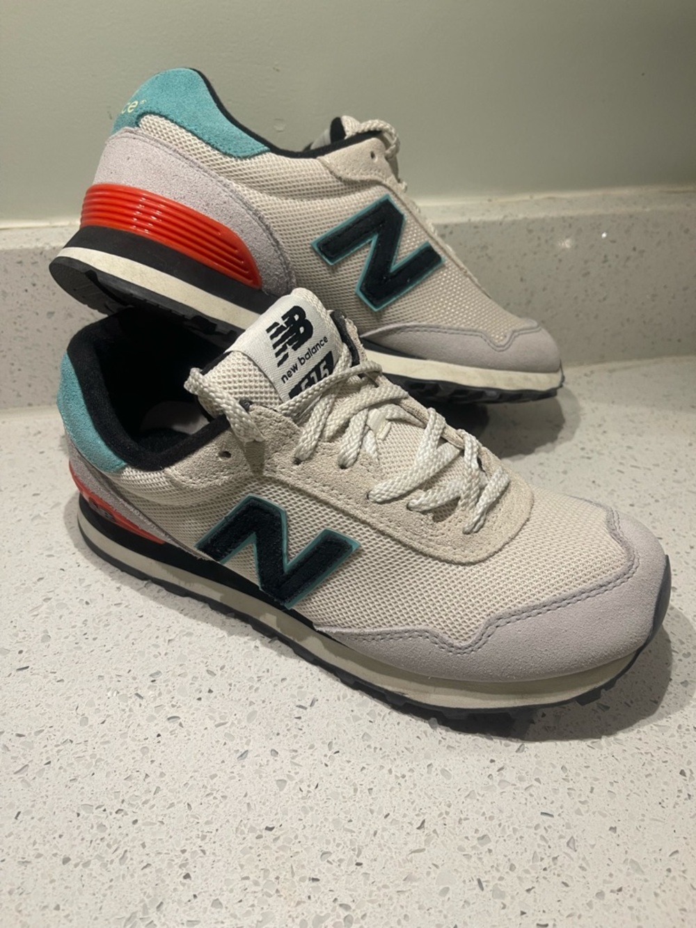 New Balance 515 Sneakers in Cream with Teal & Red Accents. Like new condition.